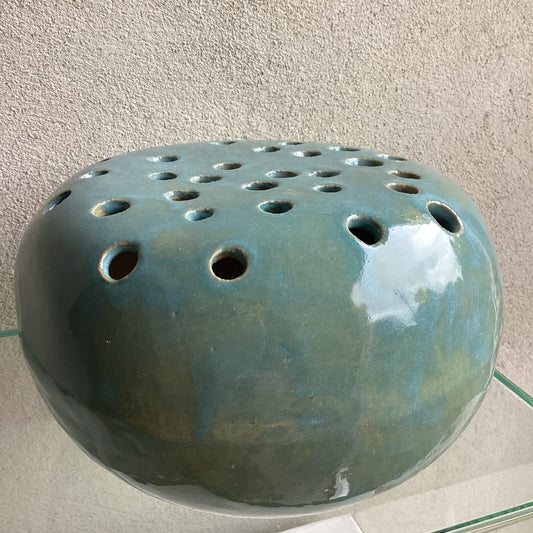 Vase with holes