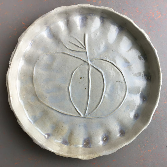 Plate with apple